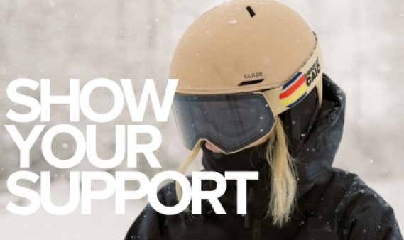 Woman wearing helmet and googles with text saying "Show Your Support"