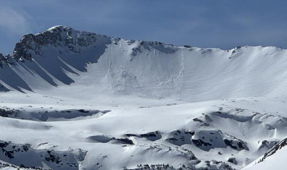 Looking at an avalanche on a steep slope in the distance