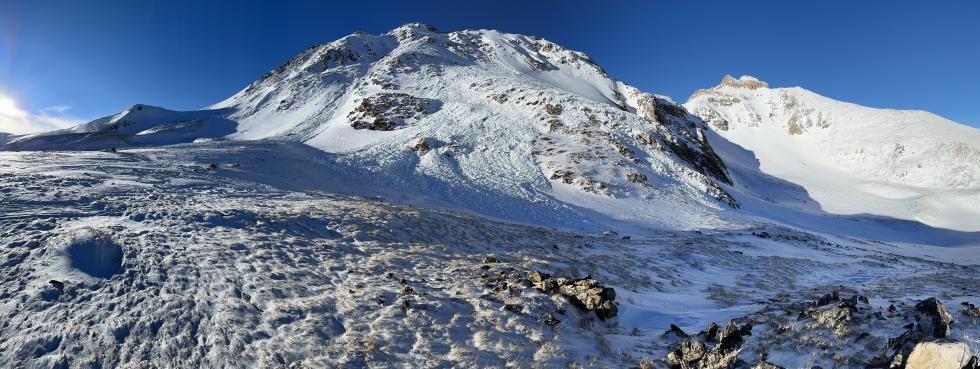 A large avalanche on the southeast face of Hagar Mountain that produced the three separate debris piles in this picture.